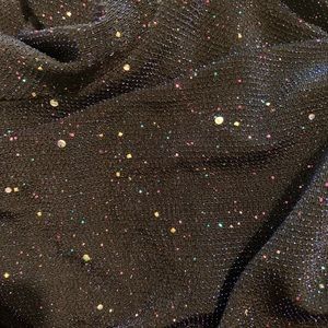 Beautiful new, stretchy, classy , small to size. Fits body nicely , Not worn.